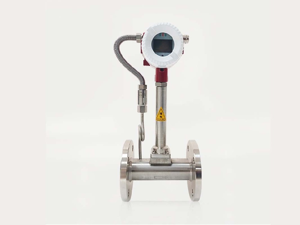 Temperature and pressure compensated vortex flowmeter